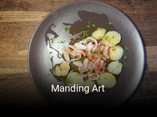 Réserver une table chez Manding Art maintenant